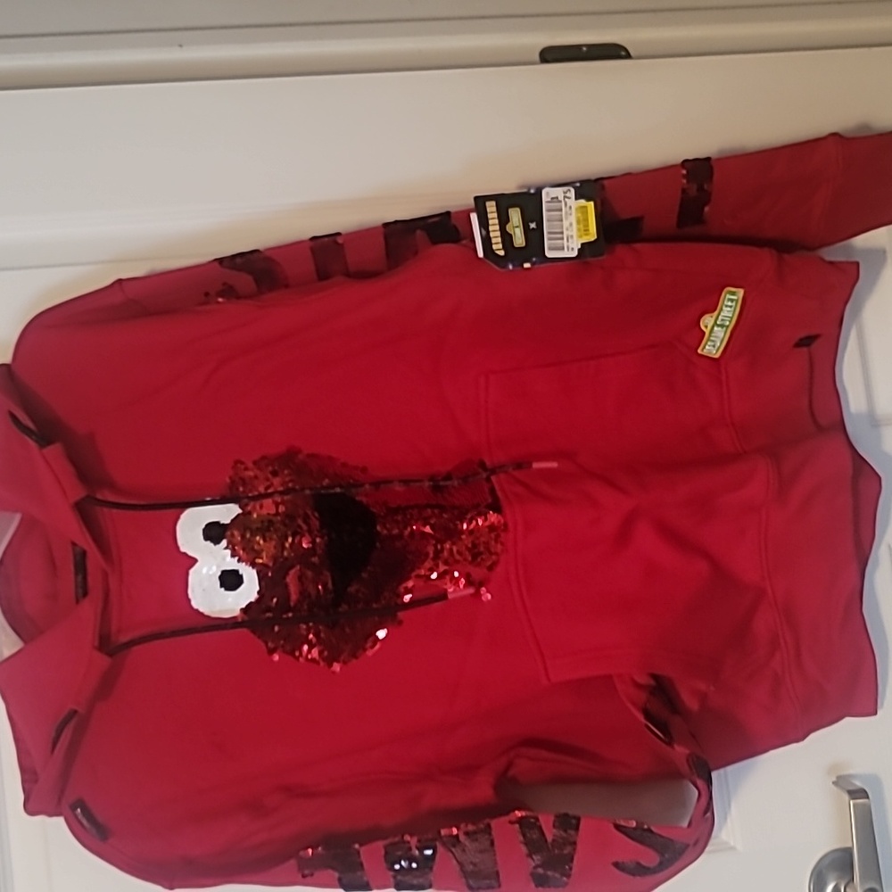 Sesame street Elmo hoodie runs small fits more like a large